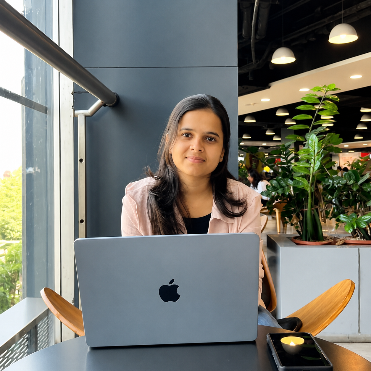 Reshma Rautmale working at her laptop